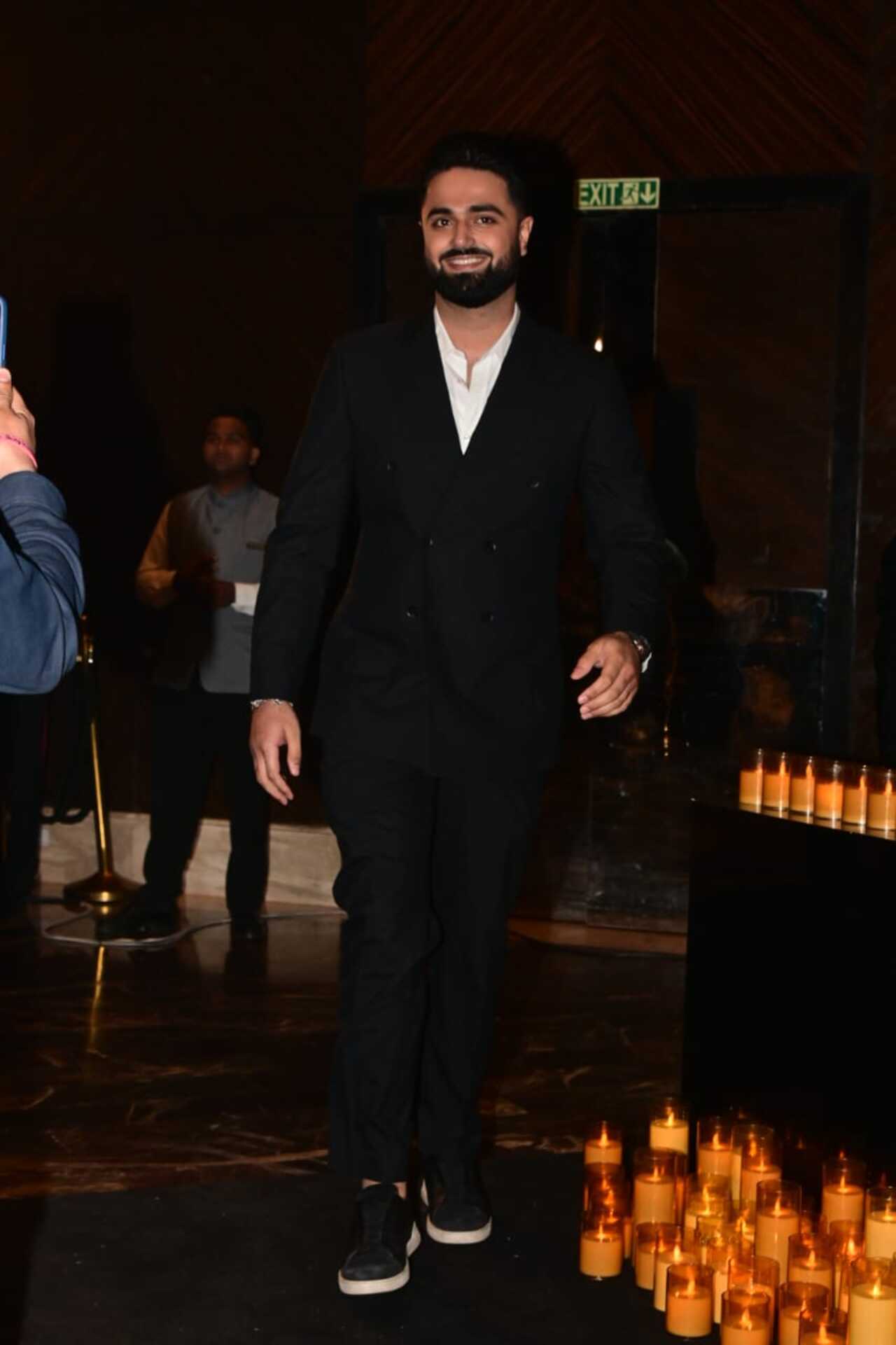 Kriti Sanon's rumoured boyfriend Kabir Bahia was all smiles as he arrived for the reception party.